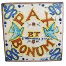Maiolica tile or paperweight of Saint Francis of Assisi Pax et Bomun by Ruffinelli