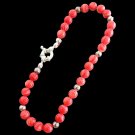 Argentina Rhodochrosite bracelet hand beaded and with silver plated spring closure In gift pouch