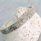 Cuff bracelet in embossed pure silver 999 Made in China by Zhang Ji Cuff bracelet in embossed pure silver 999 Made in China by Zhang Ji