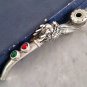 Smoking pipe in pure silver decorated with dragon and two color stones China