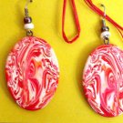 Red and white swirly disk earrings