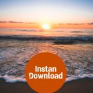 Radiant Beach Sunset: Waves Embrace the Day's End
