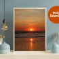 Seashore Radiance: Reflective Sunset on the Beach