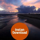Dramatic Dusk: Vivid Sunset Clouds Over the Beach