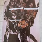 KISS HOLDING A GUITAR 21 X 30 3/4 INCHES!! EXTREMELY RARE!! KISS HOLDING A GUITAR 21 X 30 3/4 INCHES!! EXTREMELY RARE!!
