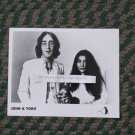 THE BEATLES JOHN AND YOKO, JOHN HOLDING A DRINK 8 X 10 INCHES BLACK AND WHITE GLOSSY PHOTO!!