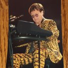 ELTON JOHN LARGE 8 X 11 INCHES HIGH QUALITY PHOTO WEARING YELLOW AND BLACK SUIT ON STAGE!!