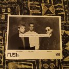 RUSH PROMO HORIZONTAL PHOTO 8 X 10 INCHES BLACK AND WHITE GLOSSY PHOTO!! RARE!!