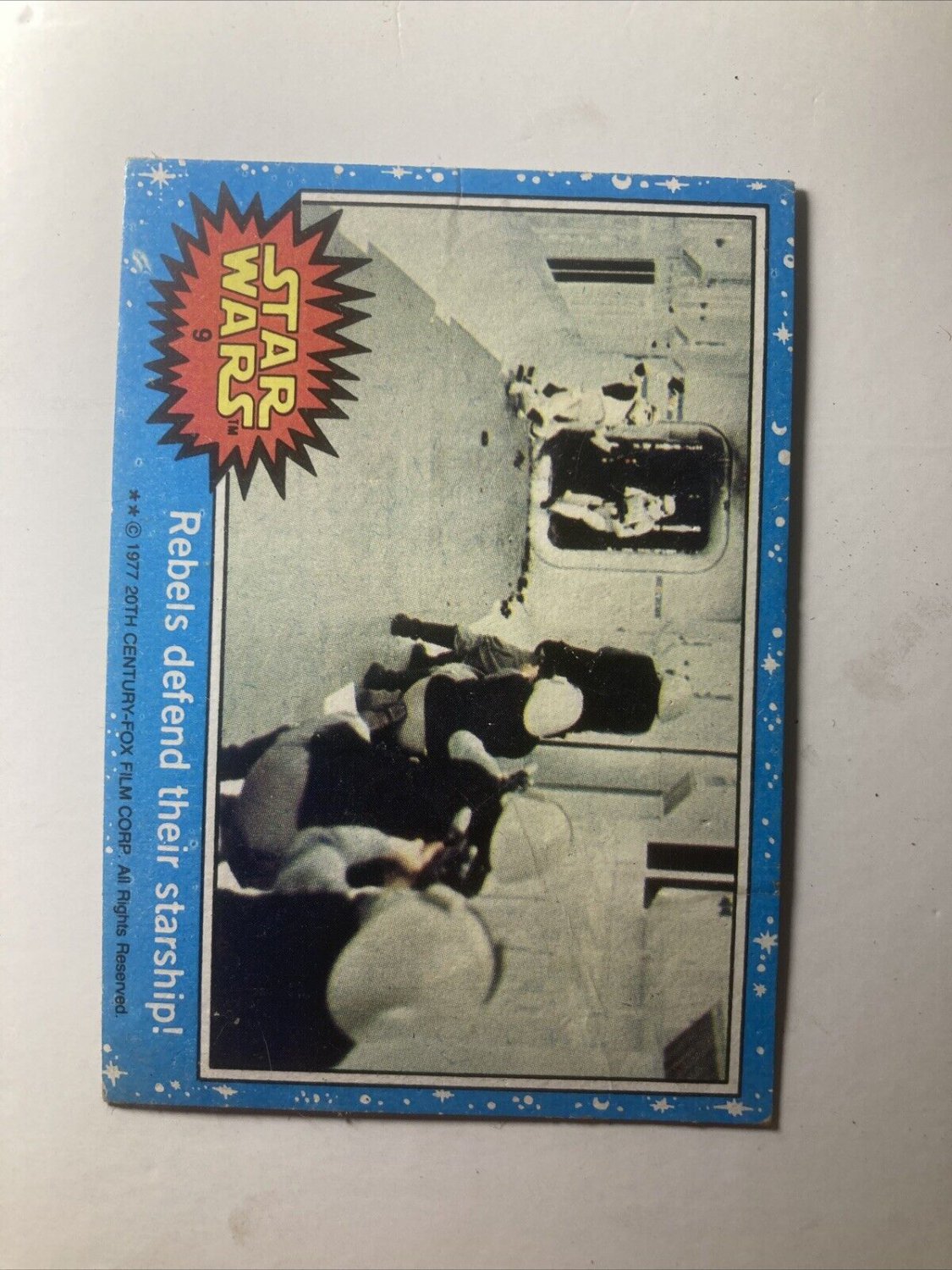 1977 TOPPS * STAR WARS SERIES 1 BLUE * CARD #9 REBELS DEFEND THEIR STARSHIP!