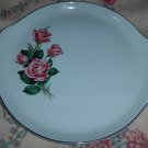 "4 Roses"? 13 inch tab handled utility plate