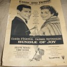vintage advertisement for the movies "Bundle Of Joy" and "Rock, Pretty Baby"