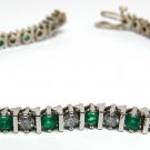 COL EMERALD/DIAMONDS TENNIS BRACELET IN 14KT WHITE GOLD