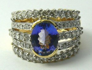 KNOCKOUT TANZANITE & DIAMOND RING 4.11TCW