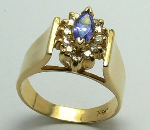 GLAMOROUS TANZANITE & DIAMOND RING