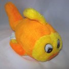 Stuffed Animal, Orange Plush Fish by Dan Brechner