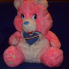 1984 Pink Care Bear, under neck is a blue heart with lace by Etone.