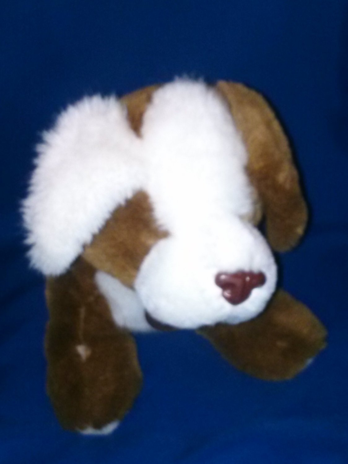 stuffed brown and white dog