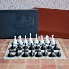 small vintage travel chess set with magnetic board in original case