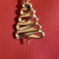 Beautiful Goldtone Vintage Swirled Christmas Tree Brooch signed CAJC