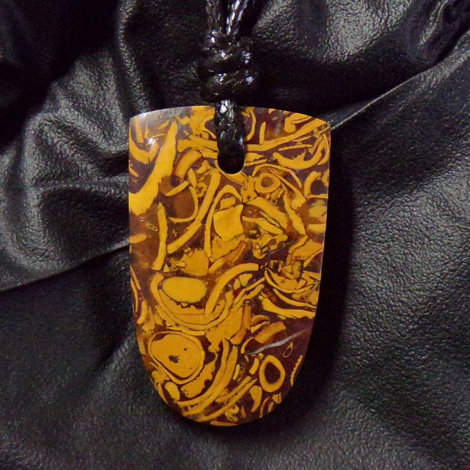 script stone pendant