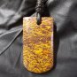 script stone pendant
