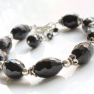 Black Onyx Oval 5x8mm Faceted beads adjustable stacking bracelet