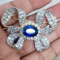 Victorian Inspired 925 Sterling Silver Cubic Zircon Blue Sapphire Bow Brooch