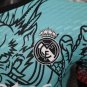 2025 real madrid blue red dragon jersey