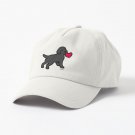 Black Labrador Puppy with a Little Heart Cap