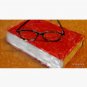 Book Under Glasses Cap