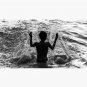 Boy playing with water Cap