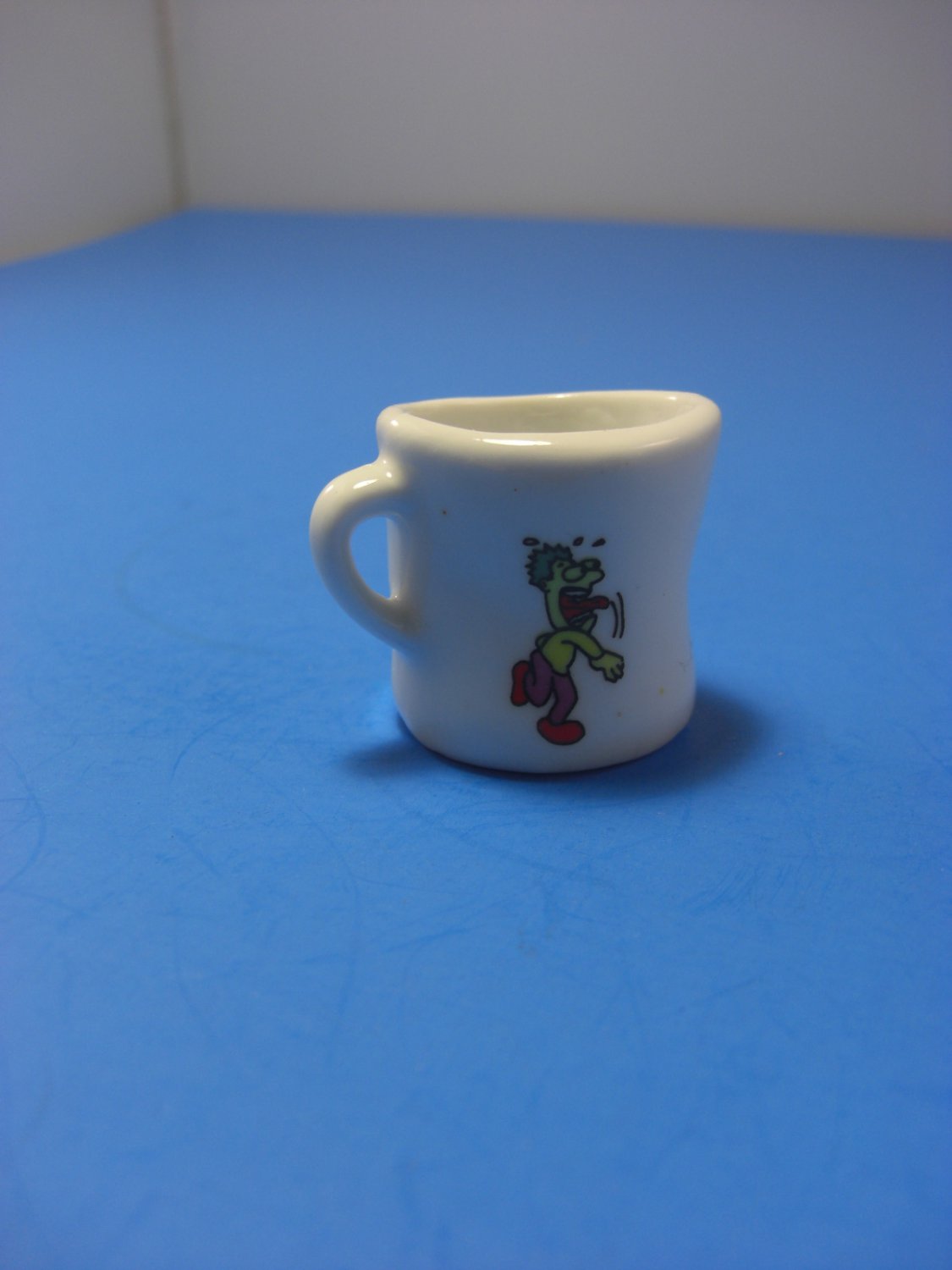 Tiny Miniature Ceramic Mug Cup Man Hitting Basketball