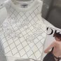 hundred and fiveChanel vest, super explosive when worn alone with a jacketOne size fits all