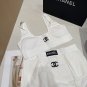 Chanel swimsuits are a must-have for fashionistas. Super body shape! SML_1068