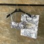 Dior strapless split bikini with detachable shoulder straps suitable for swimsuits in various sce