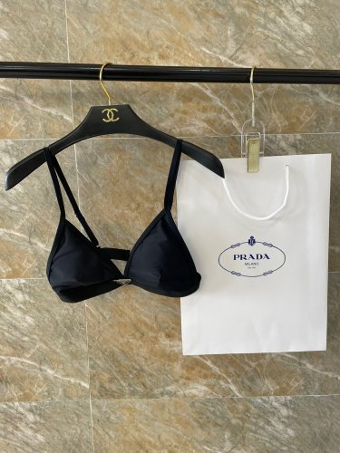 PRADA's new backless one-piece swimsuit in black, simple and atmospheric, suitable for swimming i