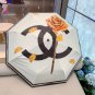 CHANEL's new rose handle with large logo, camellia triple fold automatic folding umbrel