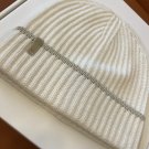 ails of the beige hat!