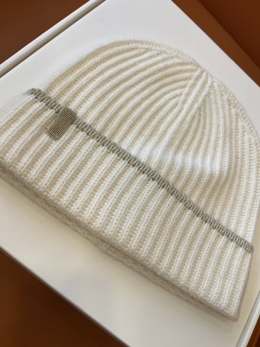 ails of the beige hat!