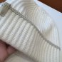 ails of the beige hat!