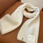 ails of the beige scarf!