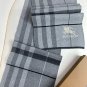 Burberry's popular new high-end men's scarf features a classic warhorse plaid pattern