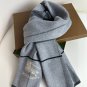 Burberry's popular new high-end men's scarf features a classic warhorse plaid pattern