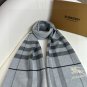 Burberry's popular new high-end men's scarf features a classic warhorse plaid pattern