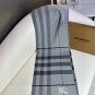 Burberry's popular new high-end men's scarf features a classic warhorse plaid pattern