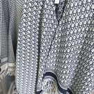Burberry's popular new high-end men's scarf features a classic warhorse plaid pattern