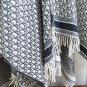 Burberry's popular new high-end men's scarf features a classic warhorse plaid pattern