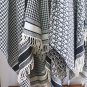 Burberry's popular new high-end men's scarf features a classic warhorse plaid pattern