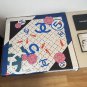 ch 110Chanel's new Xiaoxiang No. 5 Accessory Square Scarf is a silk square scarf th
