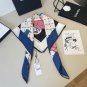 ch 110Chanel's new Xiaoxiang No. 5 Accessory Square Scarf is a silk square scarf th